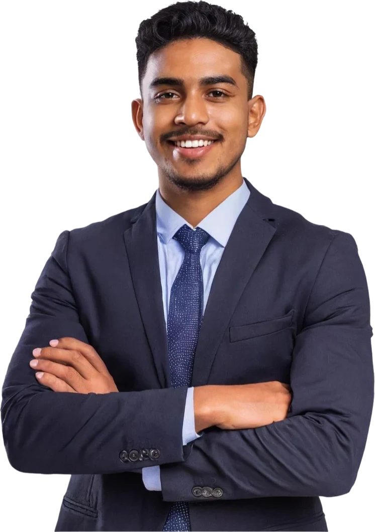 A smiling young professional with arms crossed